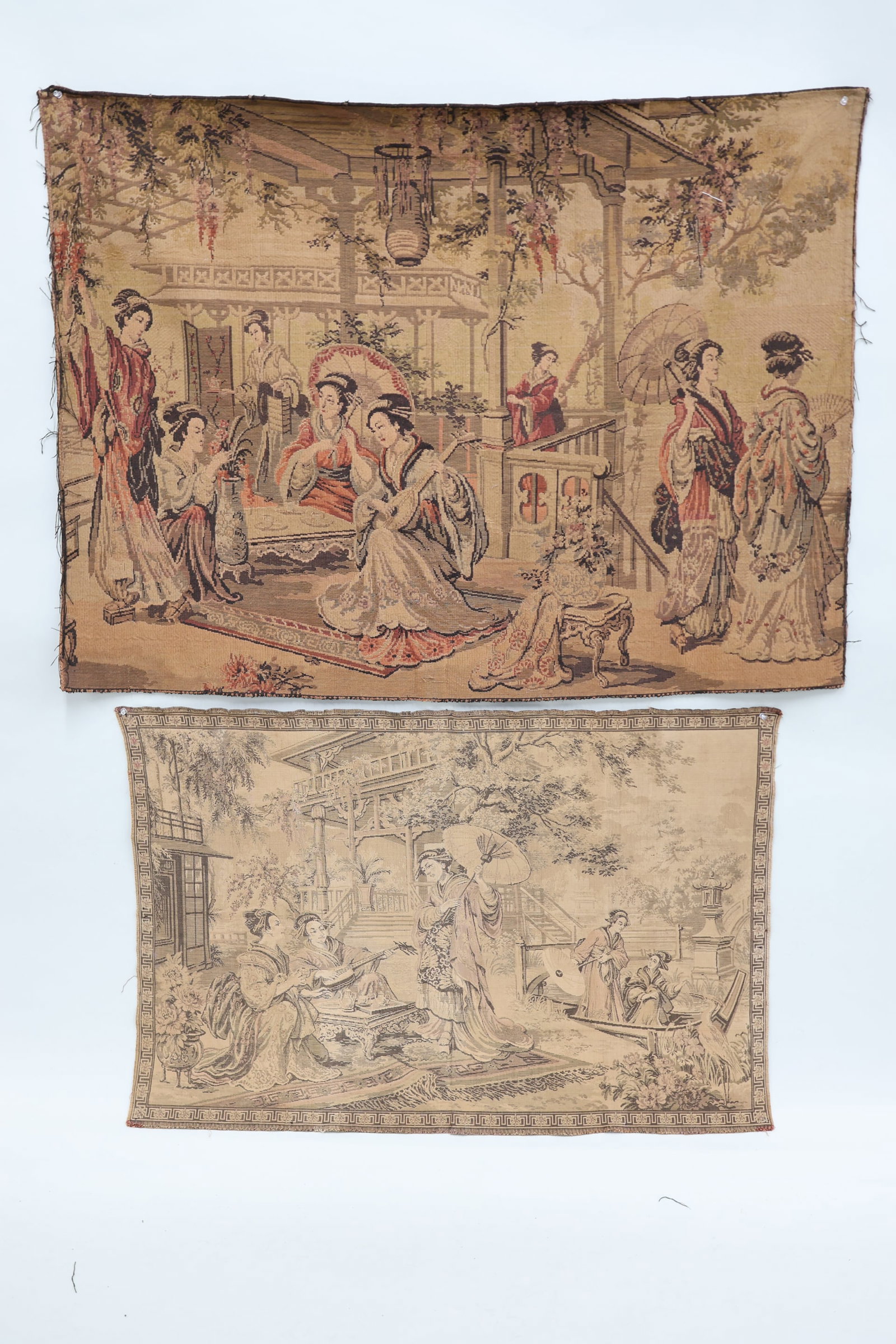 Two Vintage Asian Tapestries: Two Vintage Asian Tapestries Two Vintage Asian Tapestries each depicting Geishas with musical instruments. Used condition, wear, worn, losses, stains. Smallest measures 29" x 43 1/4", largest