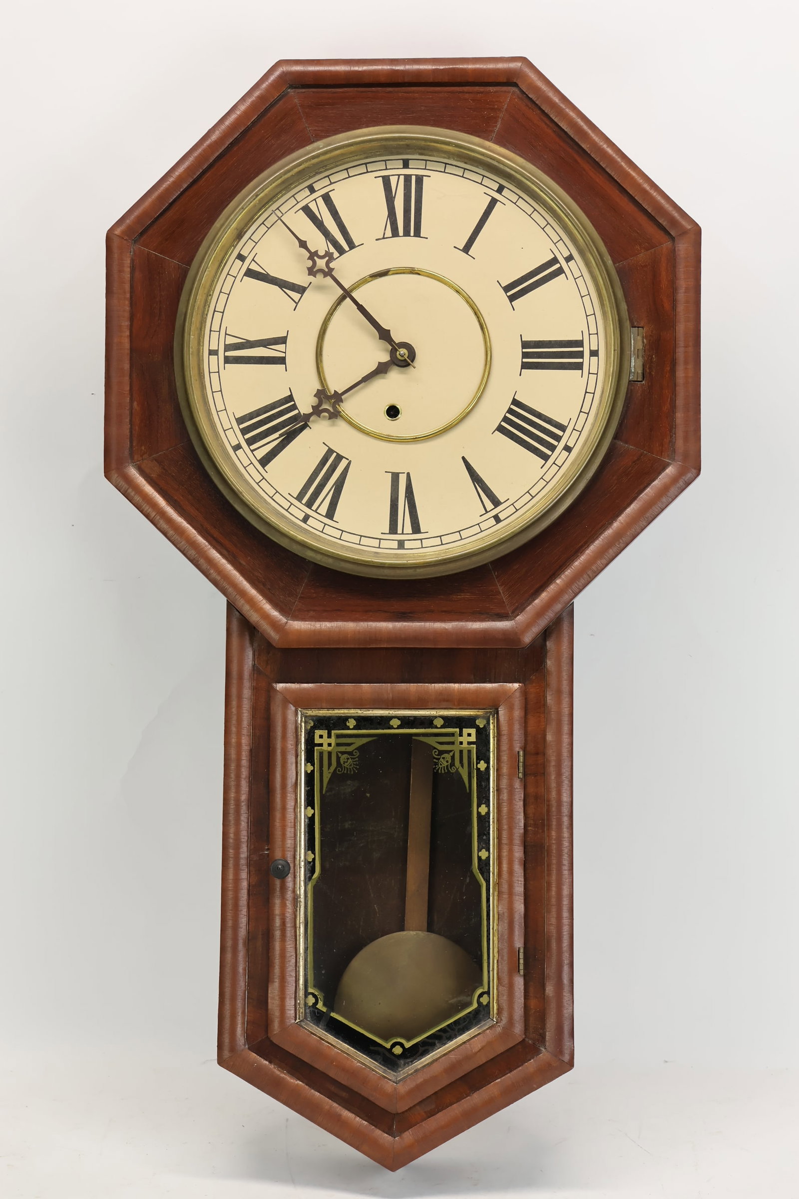 Antique Schoolhouse Wall Clock in Mahogany Case: Antique Schoolhouse Wall Clock in Mahogany Case Antique Schoolhouse Wall Clock in Mahogany Case; used unknown working condition; 31"h x 17"w x 4 1/2"d