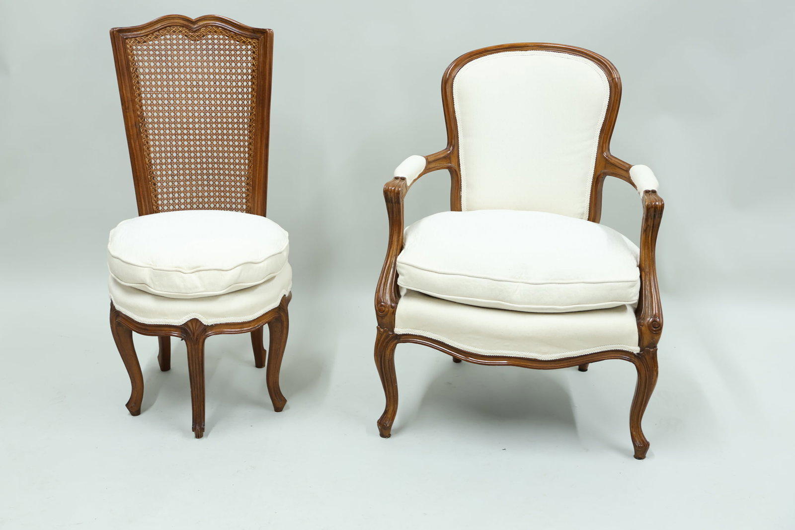 Louis XV Style Fruitwood White Upholstered Fauteuil: Louis XV Style Fruitwood White Upholstered Fauteuil Louis XV Style Fruitwood White Upholstered Fauteuil. Together with a Louis XV style fruitwood boudoir chair. Used condition, wear, worn. Fauteuil