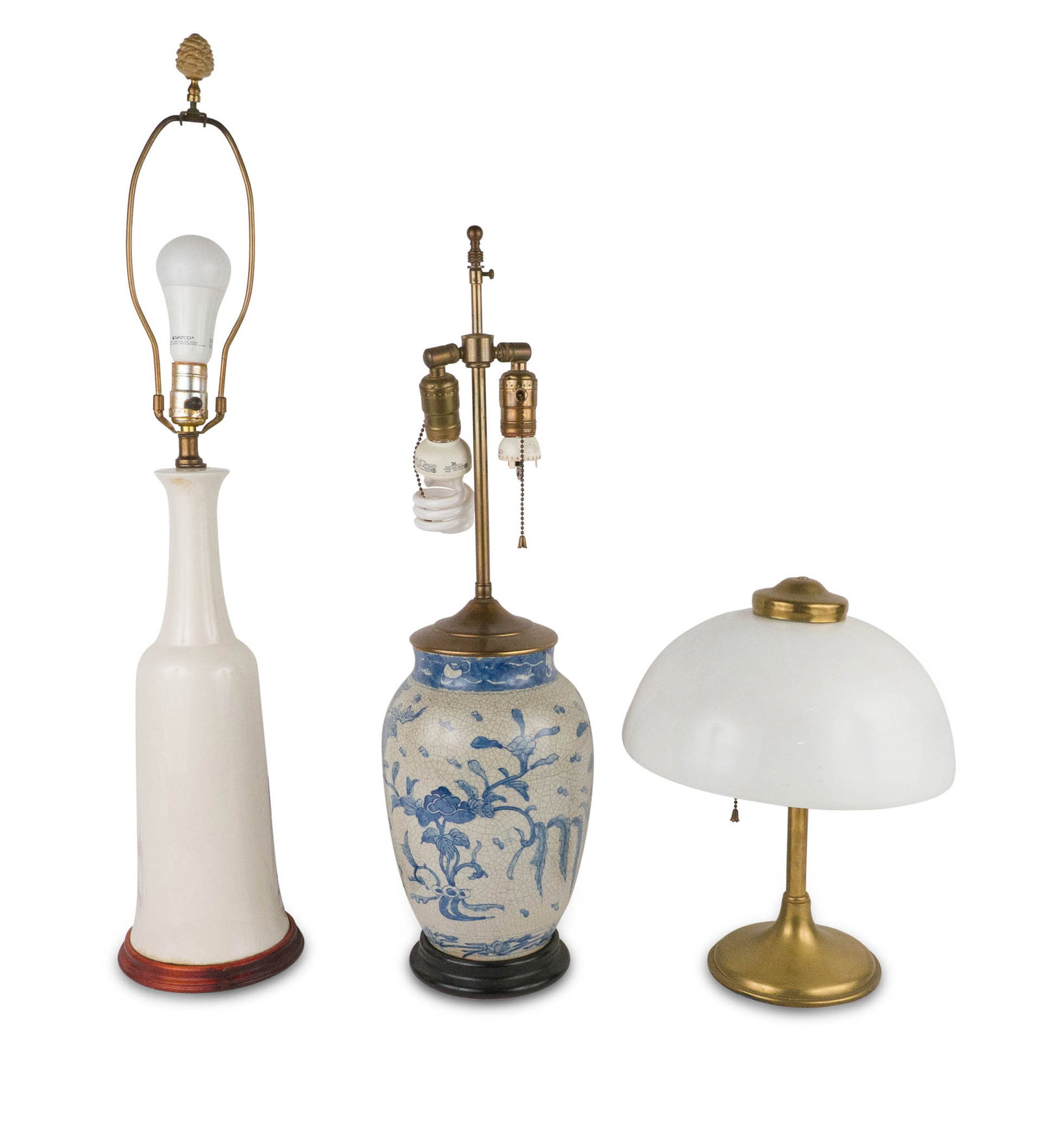 Blue and White Porcelain Table Lamp: Blue and White Porcelain Table Lamp Together with a white porcelain table lamp, and a brass table lamp with glass shade. Stains, wear, surface distress. Largest: 33 3/4 x 7 1/4 in. (85.7 x 18.4 cm.)