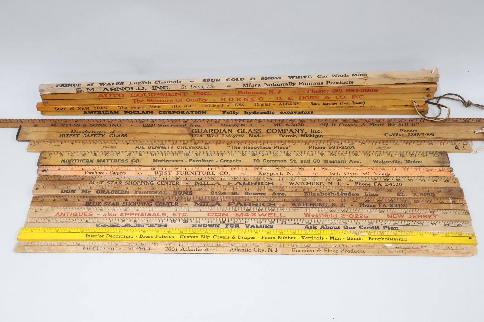 Vintage Group of 17 Assorted Advertising Yardsticks: Vintage Group of 17 Assorted Advertising Yardsticks Vintage Group of 17 Assorted Advertising Yardsticks. Including Mila Fabrics Watchung NJ, Terminal Mill Ends Union NJ, Don Maxwell Antiques