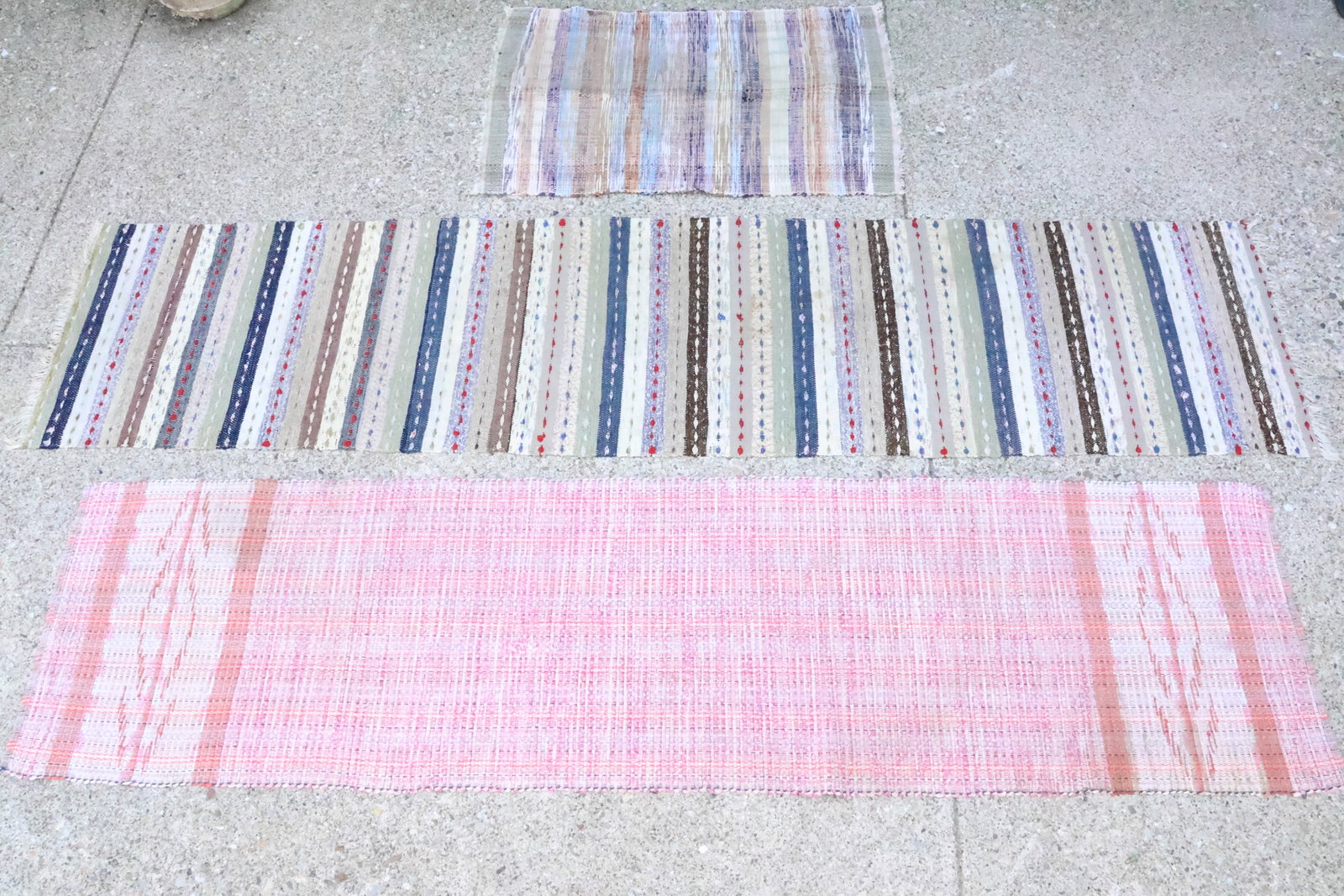 Two Vintage Rag Rug Runners: Two Vintage Rag Rug Runners Two Vintage Rag Rug Runners, largest runner measures 114" x 26 1/2" and the other measures 100" x 26". Together with rag throw rug 43" x 28 1/2". Used, wear, worn, losses,
