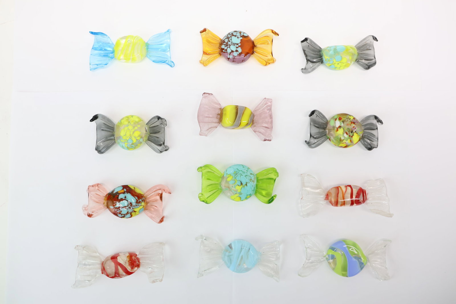 Twelve Vintage Murano Made In Italy Hand Blown Glass Candies: Twelve Vintage Murano Made In Italy Hand Blown Glass Candies Twelve Vintage Murano Made In Italy Hand Blown Glass Candies. Each Candy has a foil label and come in various sizes, shapes and colors.