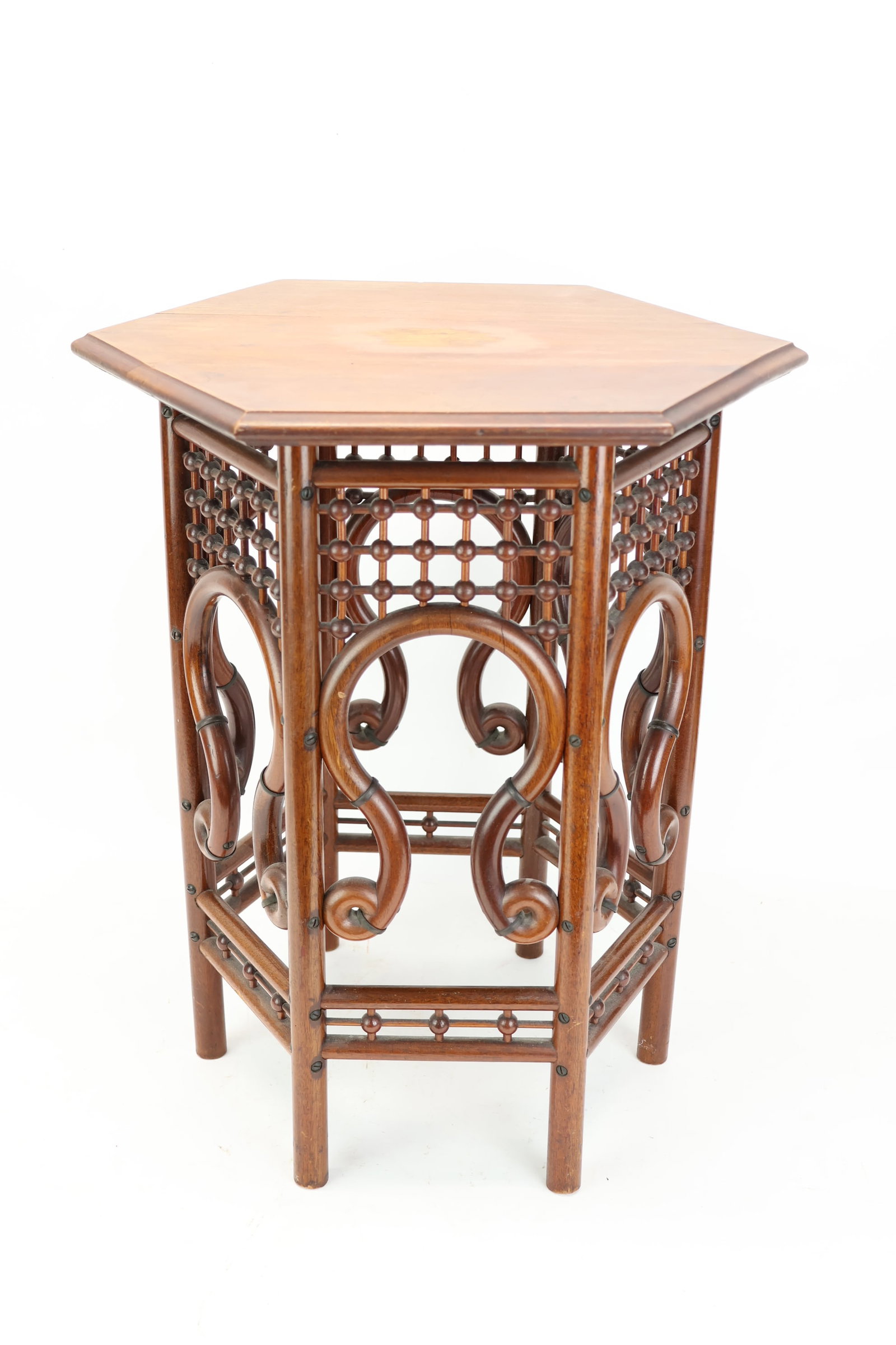 Arts and Craft Style Stick and Ball Moorish Occasional Table: Arts and Craft Style Stick and Ball Moorish Occasional Table Arts and Craft Style Stick and Ball Moorish Occasional Table with scrolled bentwood side supports and hexagon shaped top. Used condition, w