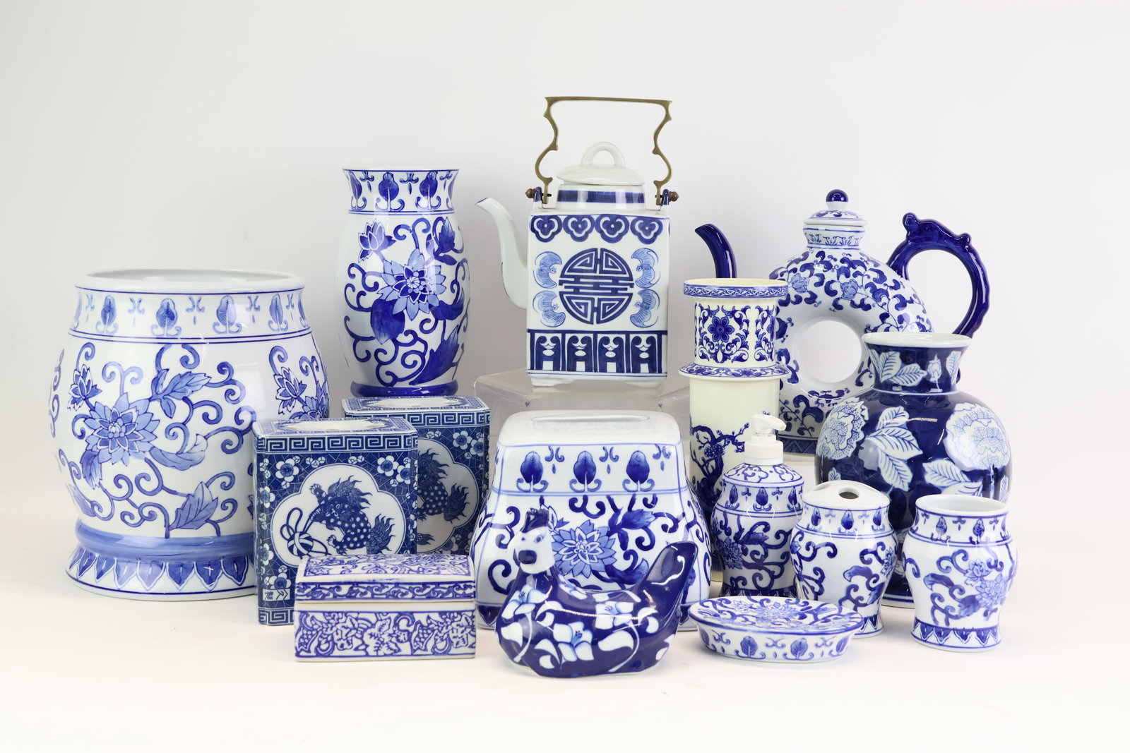 Group of Assorted Blue and White Articles: Group of Assorted Blue and White Articles Group of Assorted Blue and White Articles Including Vanity Set, Teapots, Vases, Serving Tray, Bowl and Partial Mikasa Cera Stone Dinnerware Service. Used cond