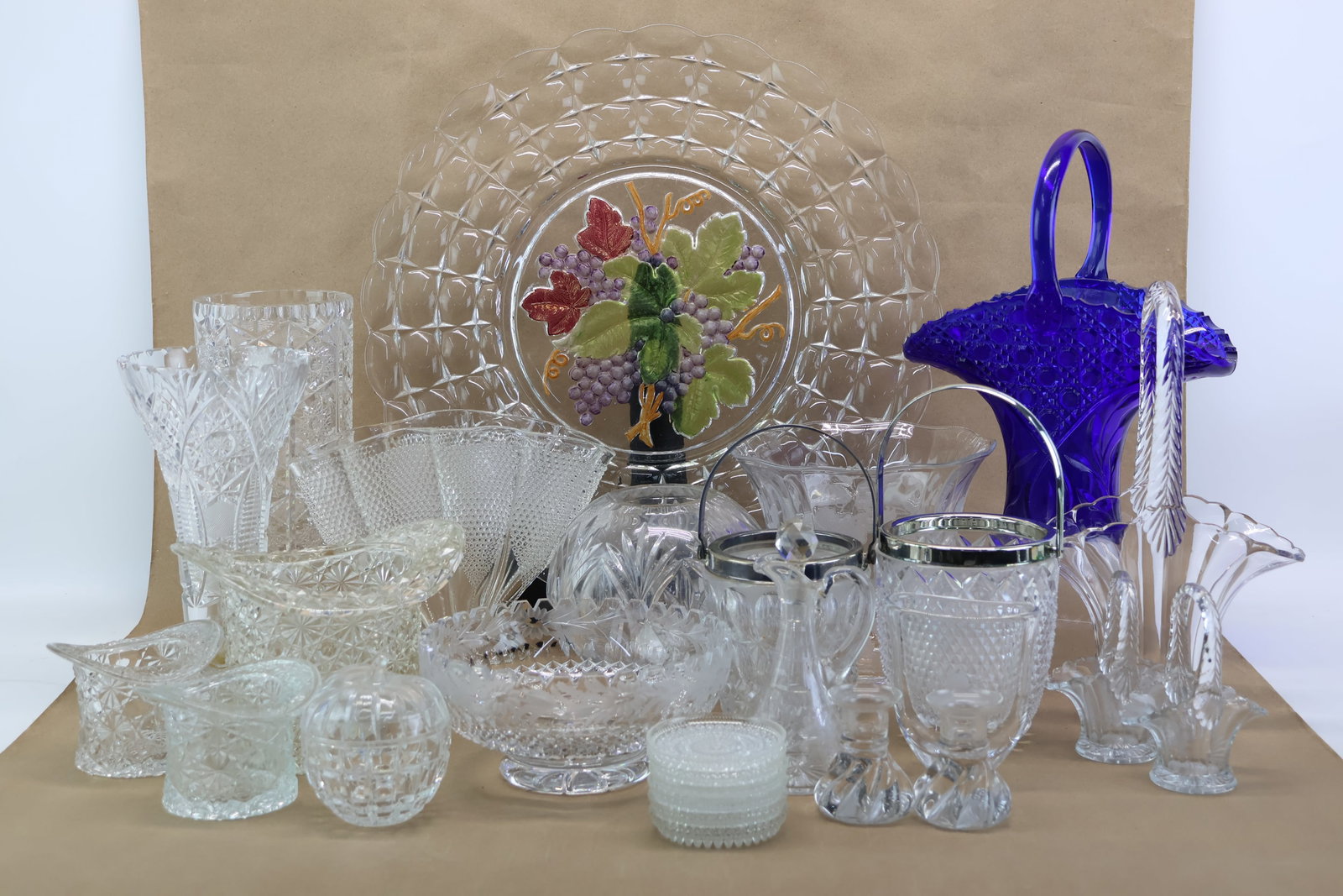Group of Assorted Glass Table Articles: Group of Assorted Glass Table Articles Group of Assorted Glass Table Articles Including Fenton Daisy and Button Hats, Smith Cobalt Glass Bridal Basket, Thousand Eyes Vase, Ice Buckets, Grape and Vine