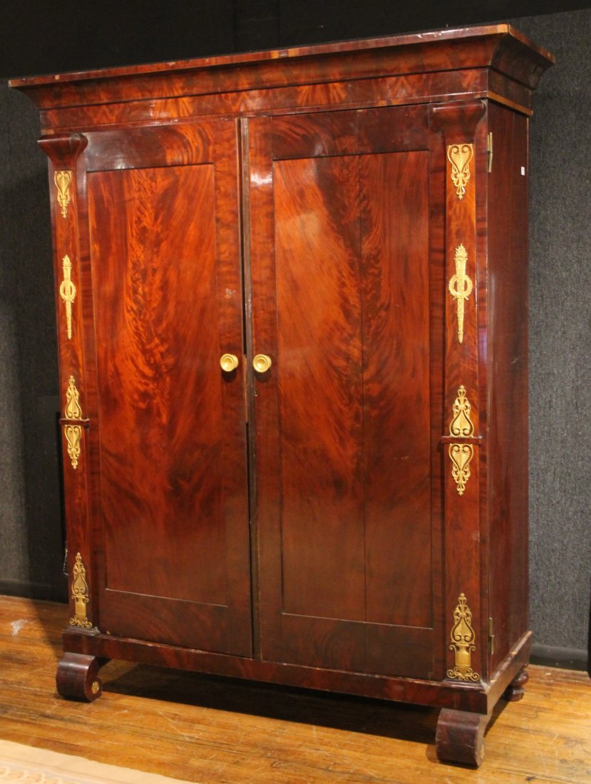 Empire Ormolu-Mounted Mahogany Armoire: American, 19th C. Provenance: Robert Demming, estate of William Doyle. 7`5"h x 5`10"w x 27"d