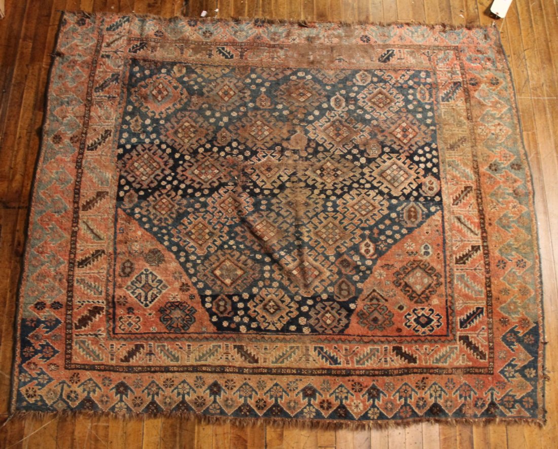 Caucasian Throw Rug: Worked in tones of red, blue, and ivory. 5`5"l x 6`4"w
