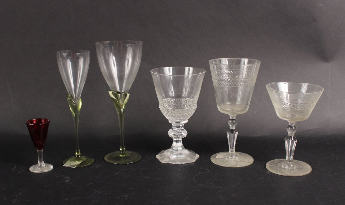 Twelve Rosenthal "Papyrus" Stemware Glasses: Comprising six each goblets and wine glasses. Together with eleven cranberry cordial glasses and nine assorted colorless stemware glasses including three Val St. Lambert. Apx. 38 pieces.