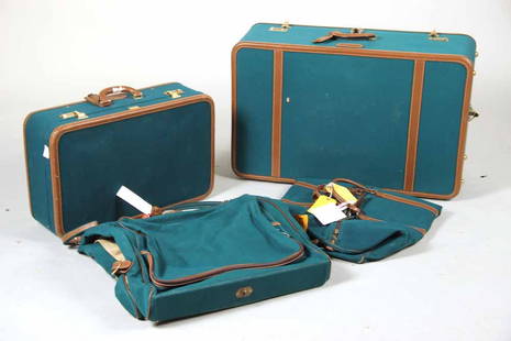 T Anthony Green Canvas and Leather Luggage: Comprising a 32" hard sided packing case, 24" hard sided packing case, duffel bag and garment bag. Monogrammed.