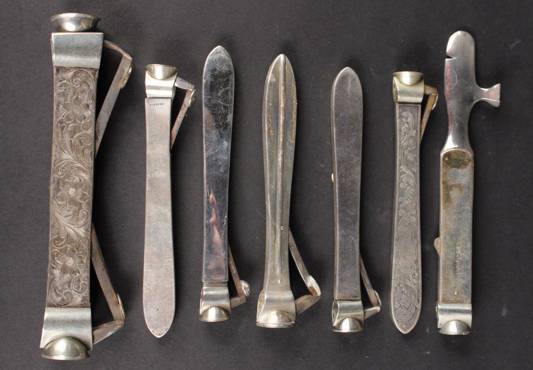 Seven Silver Metal V-Cut Cigar Cutters (1 of 8)