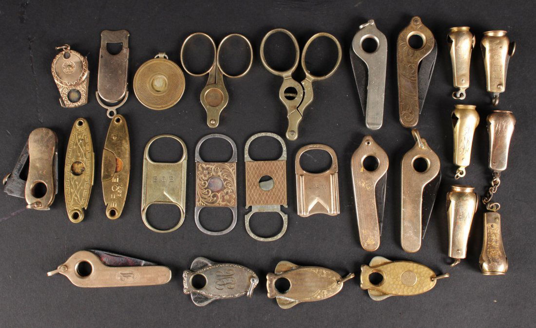 Twenty-Five Gold and Silver Tone Cigar Cutters (1 of 9)