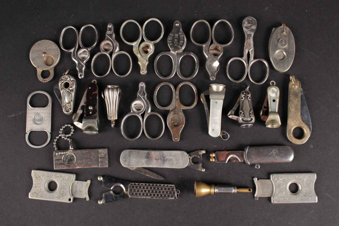 Twenty-Five Gold and Silver Tone Cigar Cutters (1 of 8)