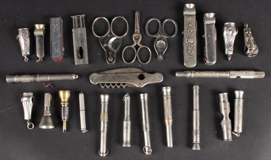 Twenty-Five Silver Metal Cigar Cutters: Eight sterling cased. 4-1/4"l