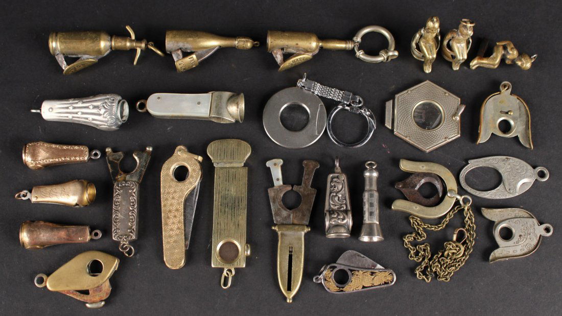 Twenty-Five Silver and Gold Metal Cigar Cutters (1 of 9)