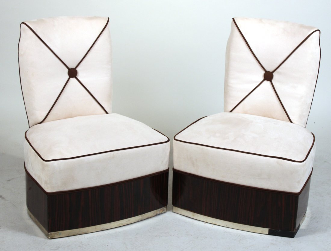 Pair of Art Deco White-Upholstered Backstools: French, early 20th C., with chrome trim on ebony base. 30-1/2"h x 21-1/2"w x 20"d