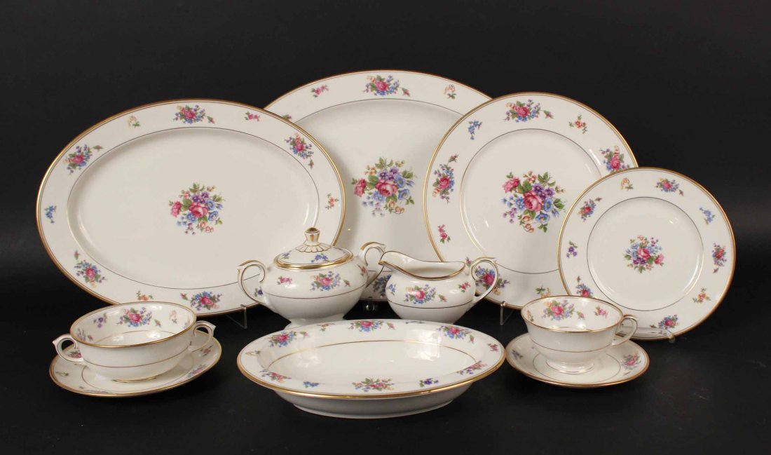 Lamberton China "Rose of Lamberton"Dinner Service: Comprising twelve each dinner plates, ten luncheon plates, twelve bread and butter plates, eight tea cups and ten saucers, twelve bullion cups, two oval platters, oval bowl, covered sugar bowl and cre