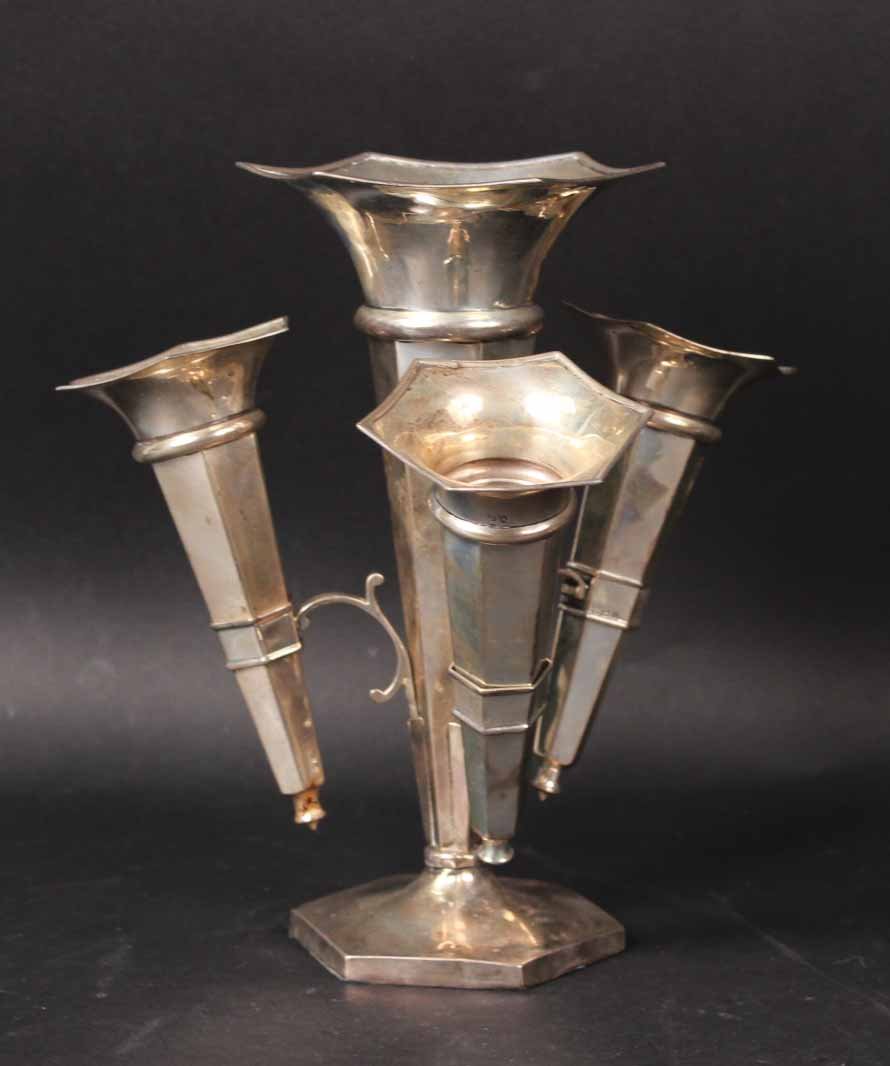 English Silver Centerpiece Epergne: Hallmarked Birmingham, 1944, weighted base, center taller vase, surrounded by three smaller vases. 9-1/4"h