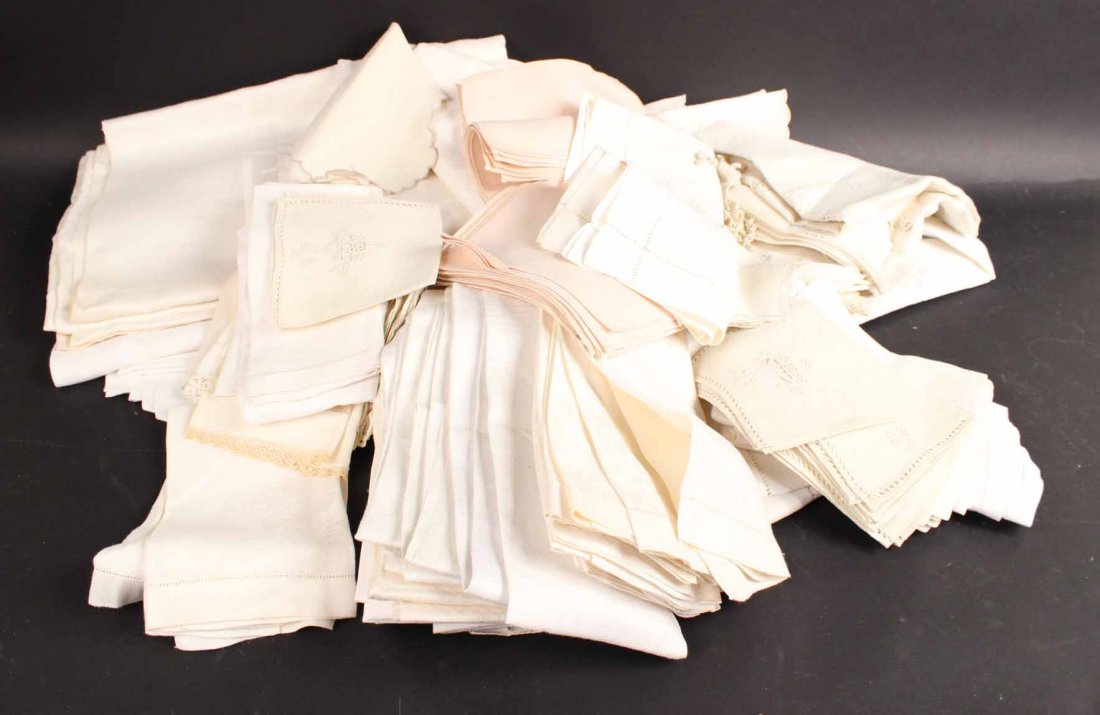 Group of Table Linens: Including table clothes and napkins.
