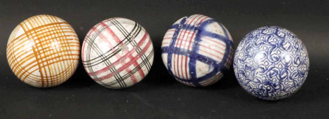 Four Polychrome Decorated Carpet Balls (1 of 5)