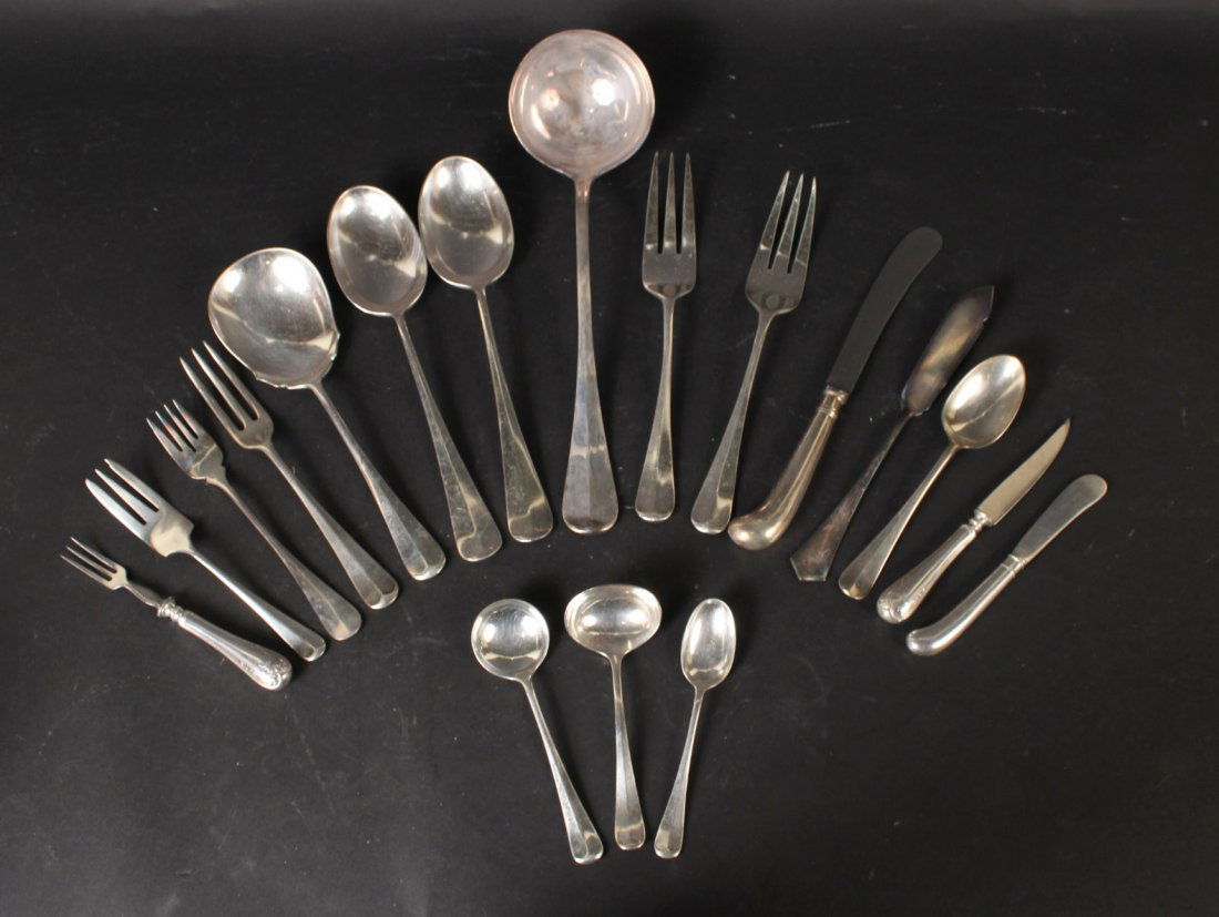 Twelve James Robinson Silver Handled Knives: With pistol handles, together with a silver handled fruit service for eight and a set of English silver plated flatware retailed by Atkin Bros. Ltd, comprising 12 dinner forks, 7 luncheon forks, 6 sal