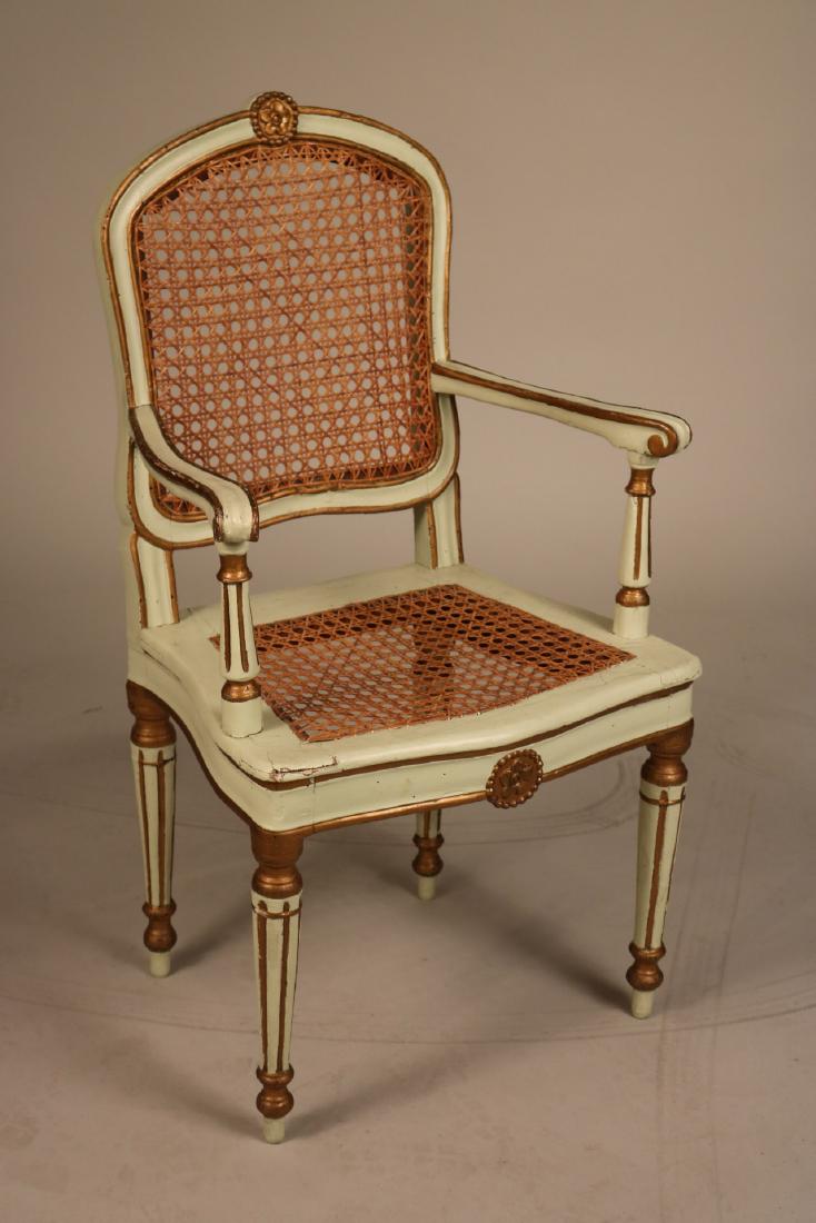 Neoclassical Parcel-Gilt and Painted Armchair: Continental, 19th C., With caned seat and back. 38-3/4"h x 12-1/2"w x 18"d