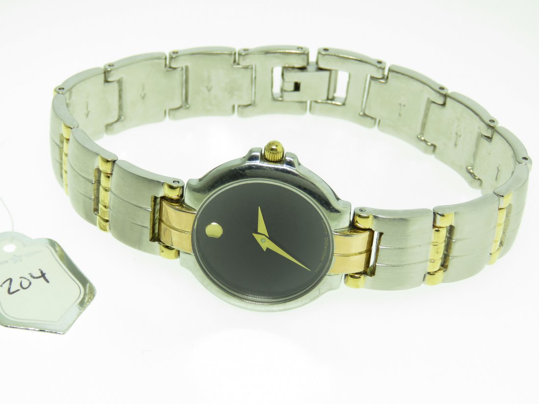MOVADO MUSEUM LADIES WRIST WATCH: MOVADO MUSEUM LADIES WRIST WATCH. CASE 20.5MM DIAMETER; FITS UP TO 7 3/4 INCH WRIST; (USED; VERY GOOD CONDITION; NO GUARANTEE ON ANY TIME PIECES; NOT TESTED; NO BOX)