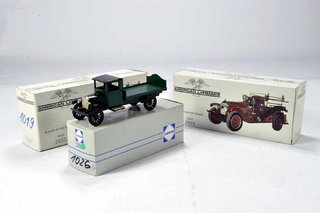 Conrad 1/50 Construction Diecast trio including Vintage: Conrad 1/50 Construction Diecast trio including Vintage Truck plus duo of American La France Fire Engines. G to E in Boxes. (3)
