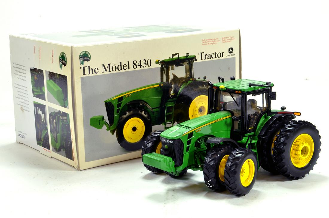 Ertl 1/32 Farm Issue comprising precision series John: Ertl 1/32 Farm Issue comprising precision series John Deere 8430 Tractor. Slight attention needed. G to VG in Box.