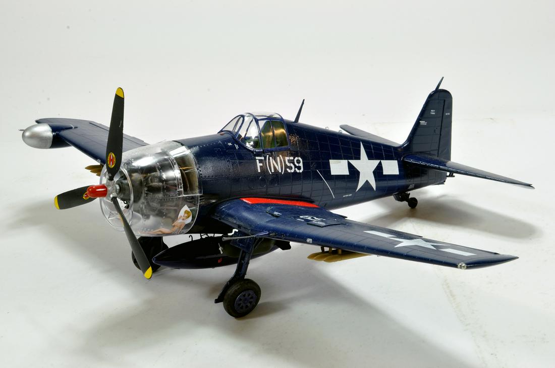 Handbuilt Plastic Impressive Aircraft Model comprising: Handbuilt Plastic Impressive Aircraft Model comprising Grumman F6F 5N Hellcat.
