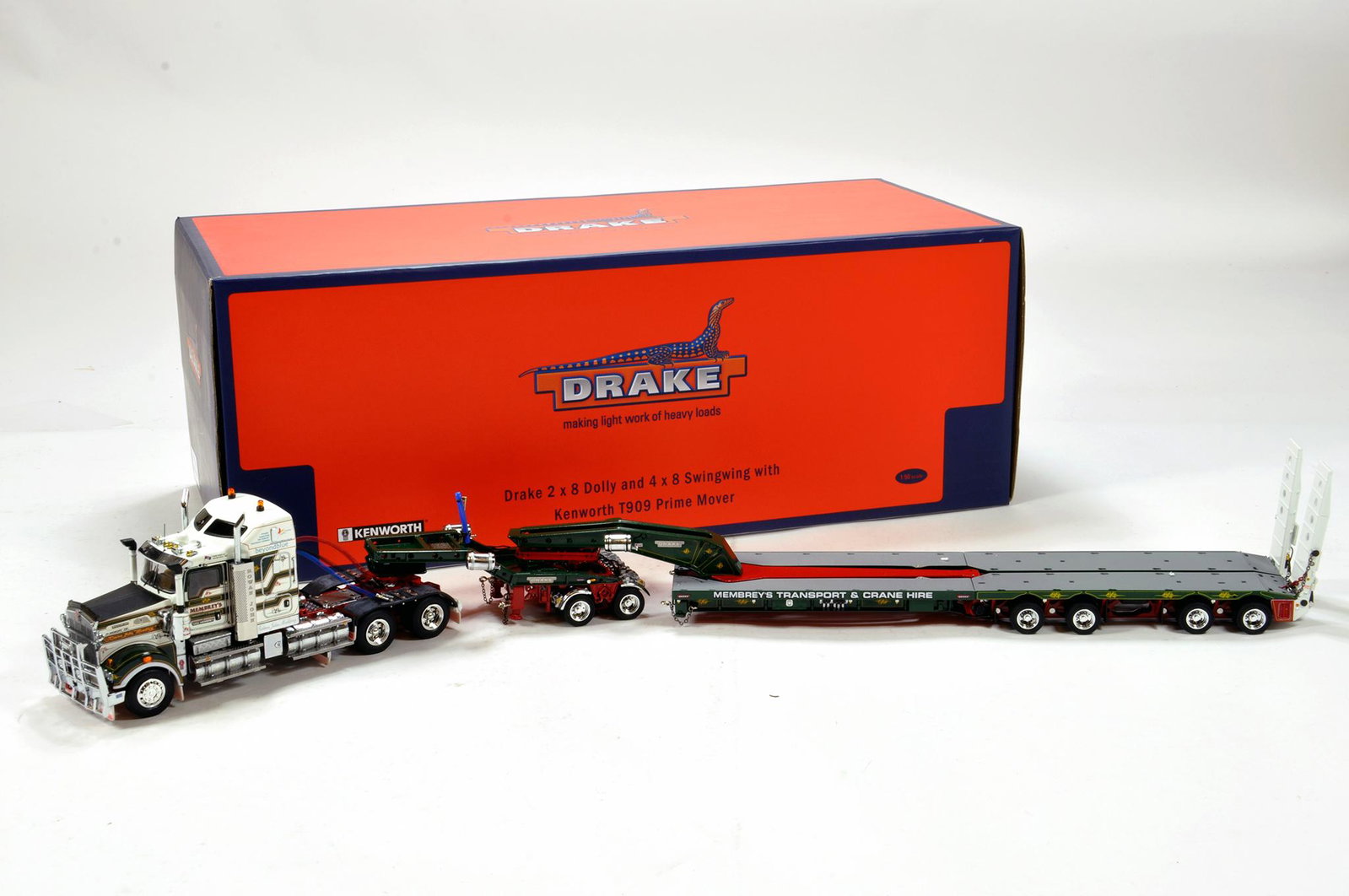 Drake Collectibles by TWH 1/50 diecast precision truck: Drake Collectibles by TWH 1/50 diecast precision truck issue comprising Kenworth T909 Prime Mover Tractor with 2 x 8 Dolly and 4 x 8 Swingwing trailer combination in livery of Membrey's. Highly exclus