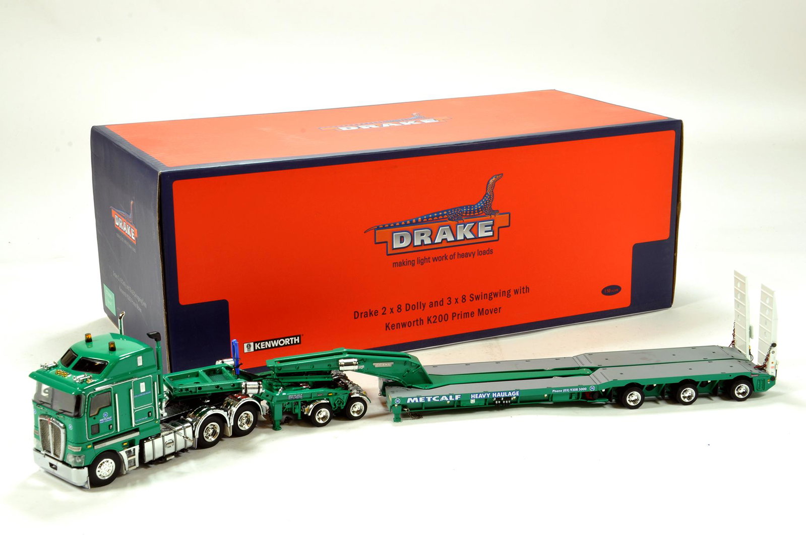 Drake Collectibles by TWH 1/50 diecast precision truck: Drake Collectibles by TWH 1/50 diecast precision truck issue comprising Kenworth K200 Prime Mover Tractor with 2 x 8 Dolly and 3 x 8 Swingwing trailer combination in livery of Metcalf. Highly exclusiv