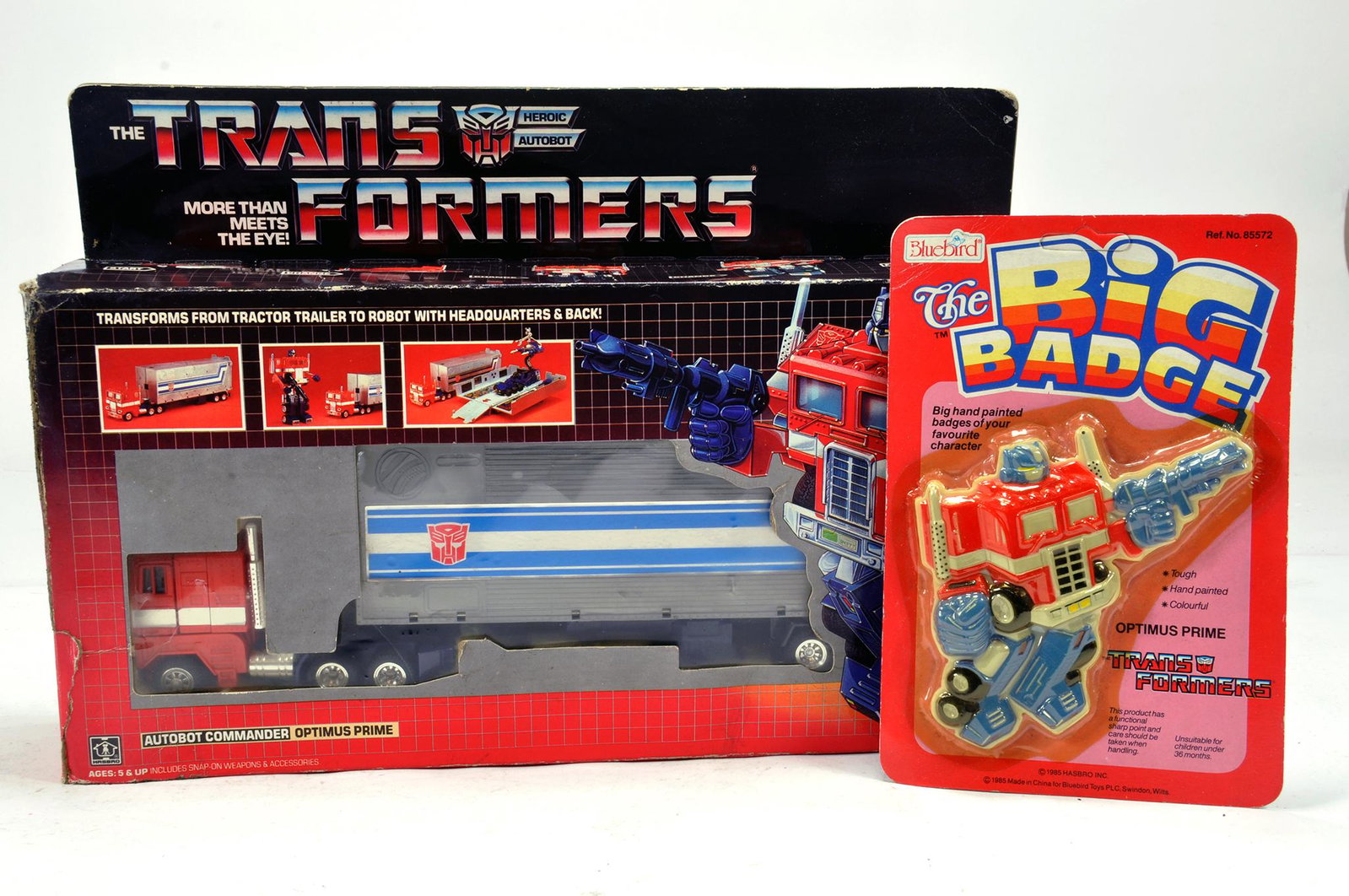 Hasbro Original Issue Transformers comprising Optimus: Hasbro Original Issue Transformers comprising Optimus Prime. Complete in Box. Plus Blue Bird Transformers Badge.