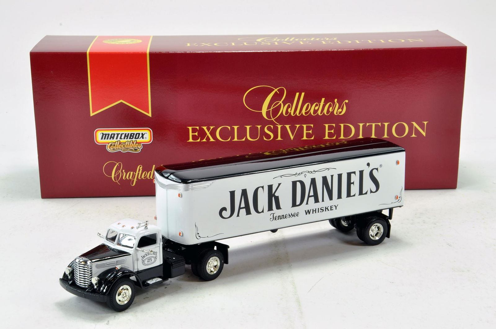 Matchbox Collectibles Diecast Truck Issue comprising: Matchbox Collectibles Diecast Truck Issue comprising Diamond T Tractor Trailer in the livery of Jack Daniels. Excellent to Near Mint in Box.