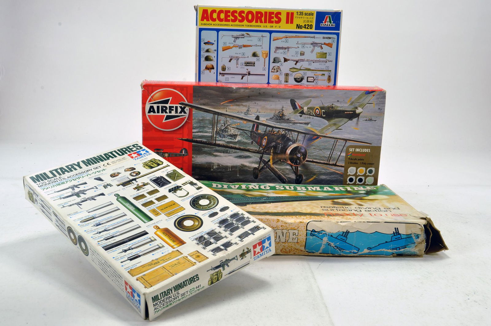 Airfix plastic model kit comprising Diving Submarine: Airfix plastic model kit comprising Diving Submarine plus Italeri Accessories, Tamiya Accessories and one other. Appear Complete.