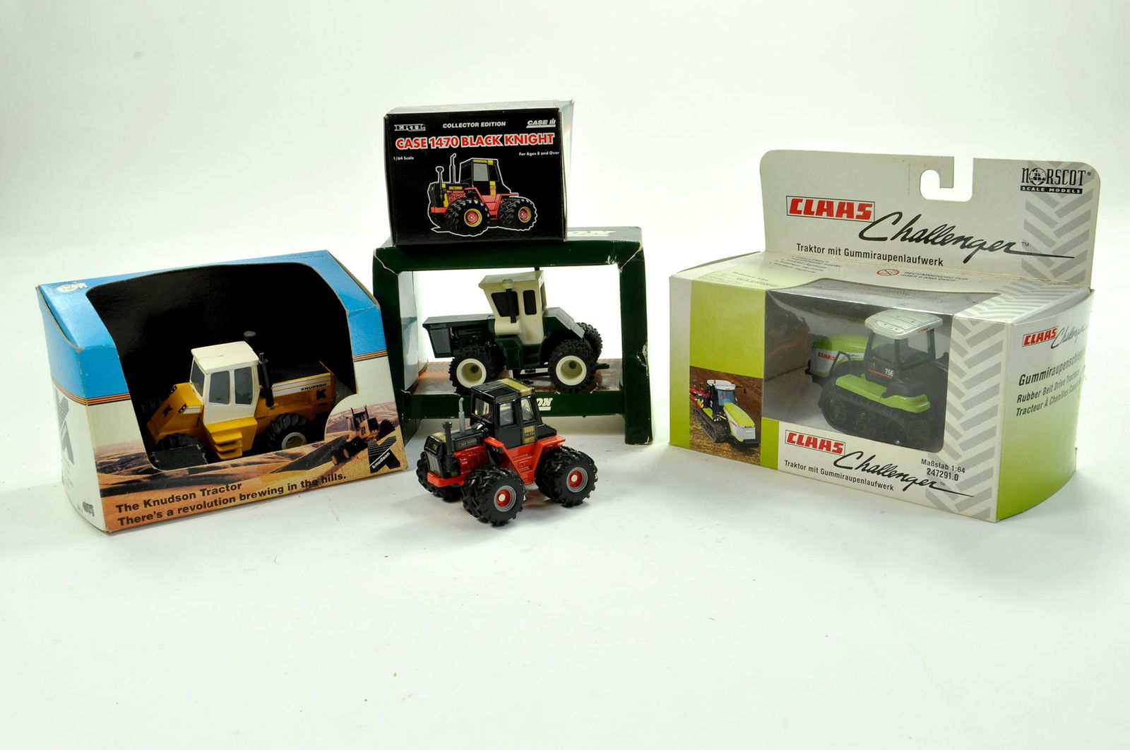 Boxed 1/64 Farm Issue group comprising Knudson Tractor (1 of 1)