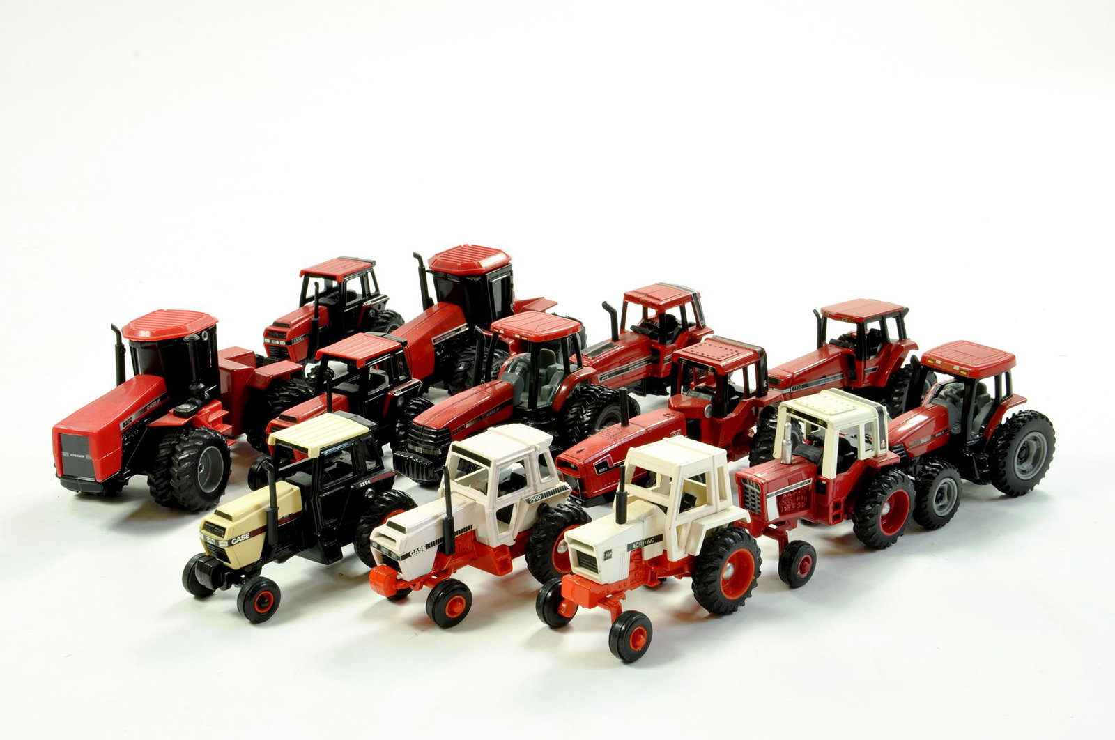 Mostly Ertl 1/64 Farm issue group comprising Case and (1 of 1)