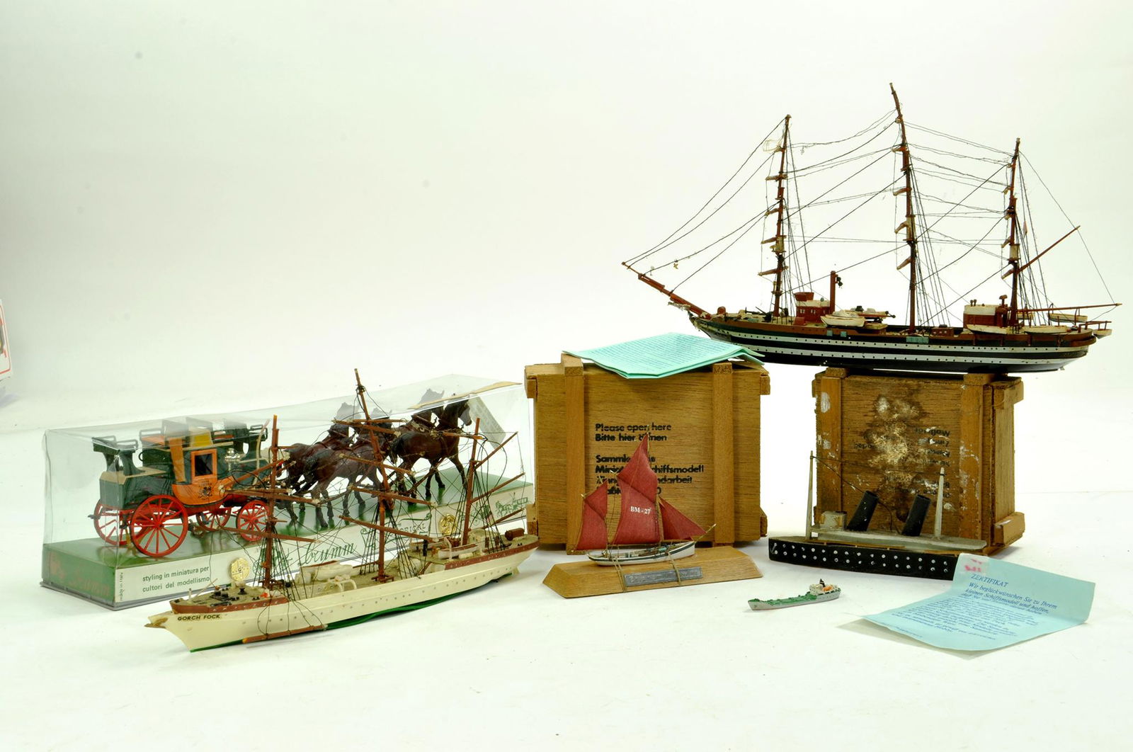 An interesting group of Waterline - Ship Models: An interesting group of Waterline - Ship Models comprising Schiffsmodel Brixham Trawler plus others and Brumm Stagecoach Set. Enhanced Condition Reports: We are more than happy to provide further imag