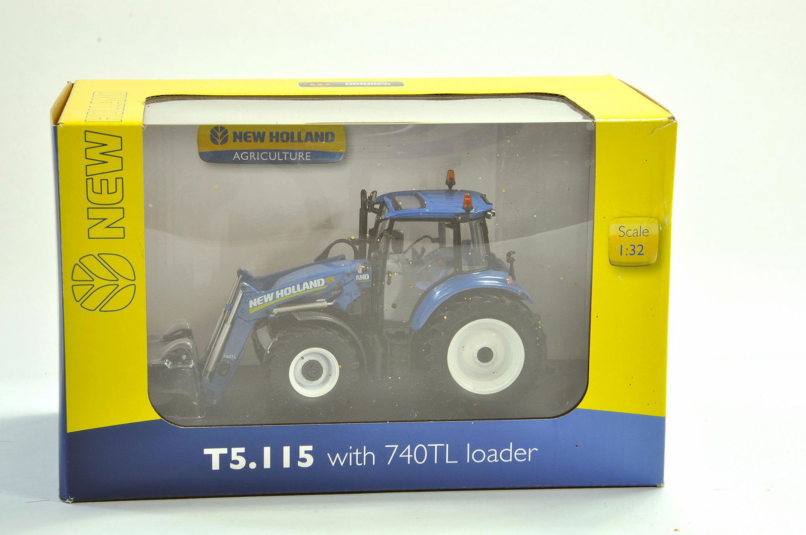 Universal Hobbies Farm issue comprising 1/32 New: Universal Hobbies Farm issue comprising 1/32 New Holland T5.115 Tractor with Loader. Appears excellent and secured within box. Condition Reports: Please contact us for additional pictures and/or enhan