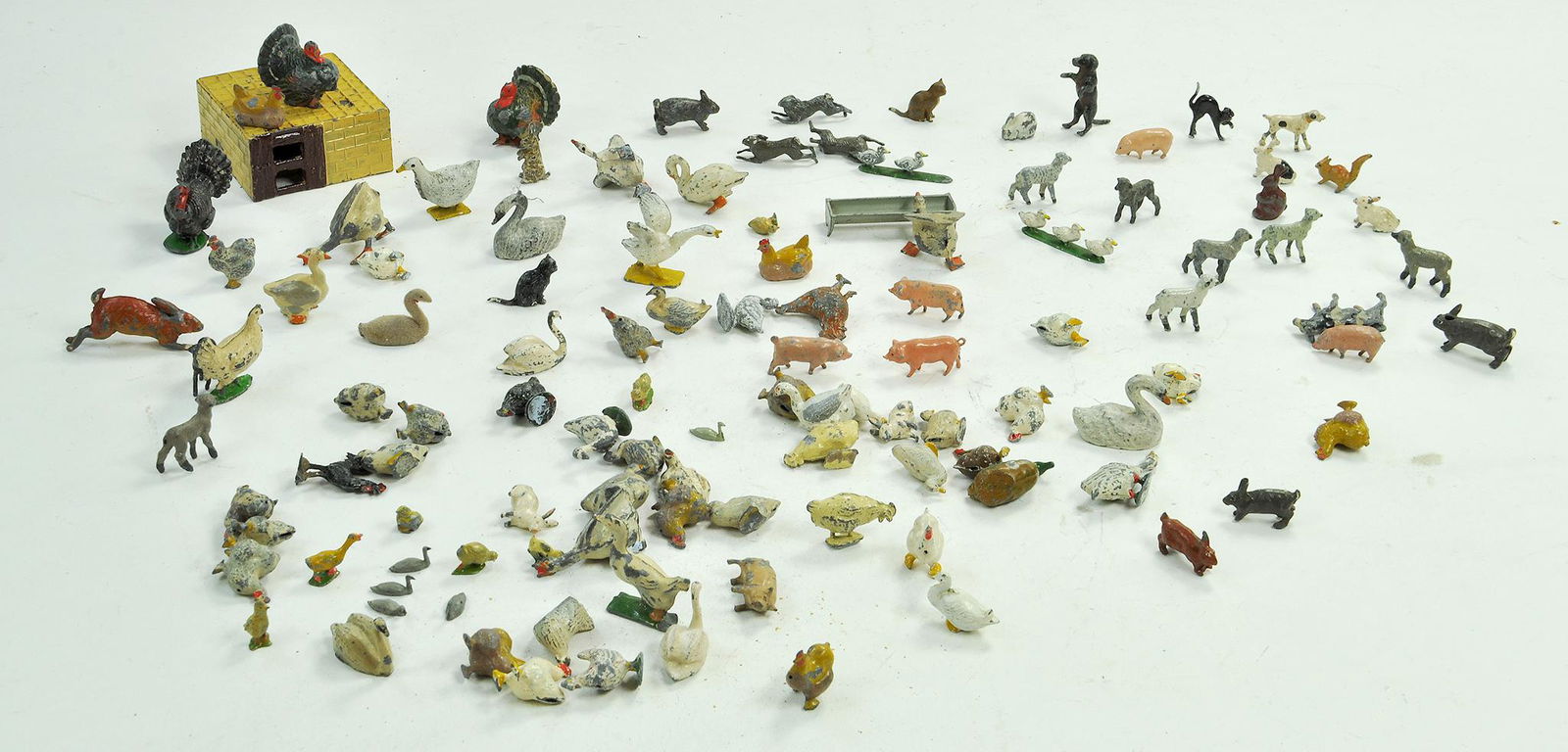A group of lead metal farm animals comprising poultry, (1 of 1)