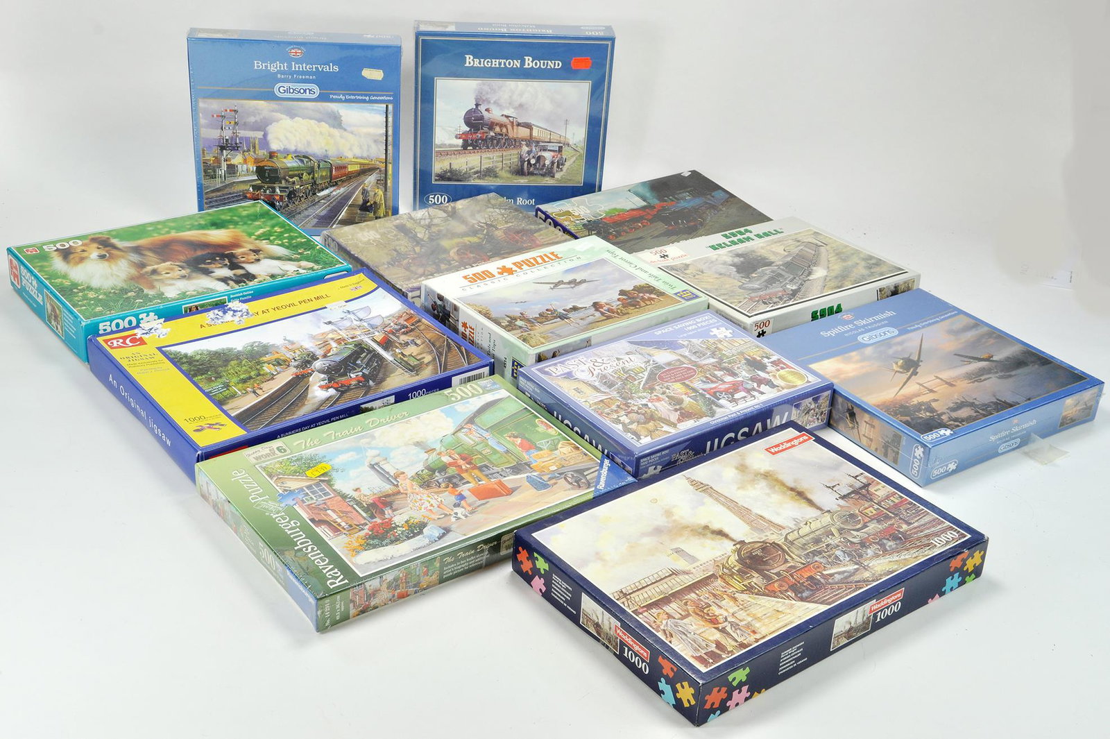 Twelve attractive and complete (some sealed) jigsaw: Twelve attractive and complete (some sealed) jigsaw puzzles of various themes including Railway, Aircraft etc.