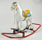 An attractive vintage rocking horse by Triang. Appears