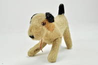 A large Vintage Farnell Fox Terrier, believed to be