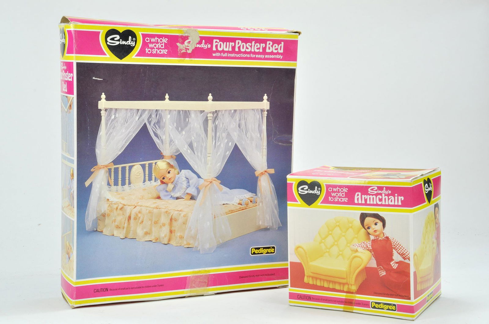 Vintage Pedigree Sindy Four Poster Bed and Armchair.: Vintage Pedigree Sindy Four Poster Bed and Armchair. Appears complete and in original boxes.