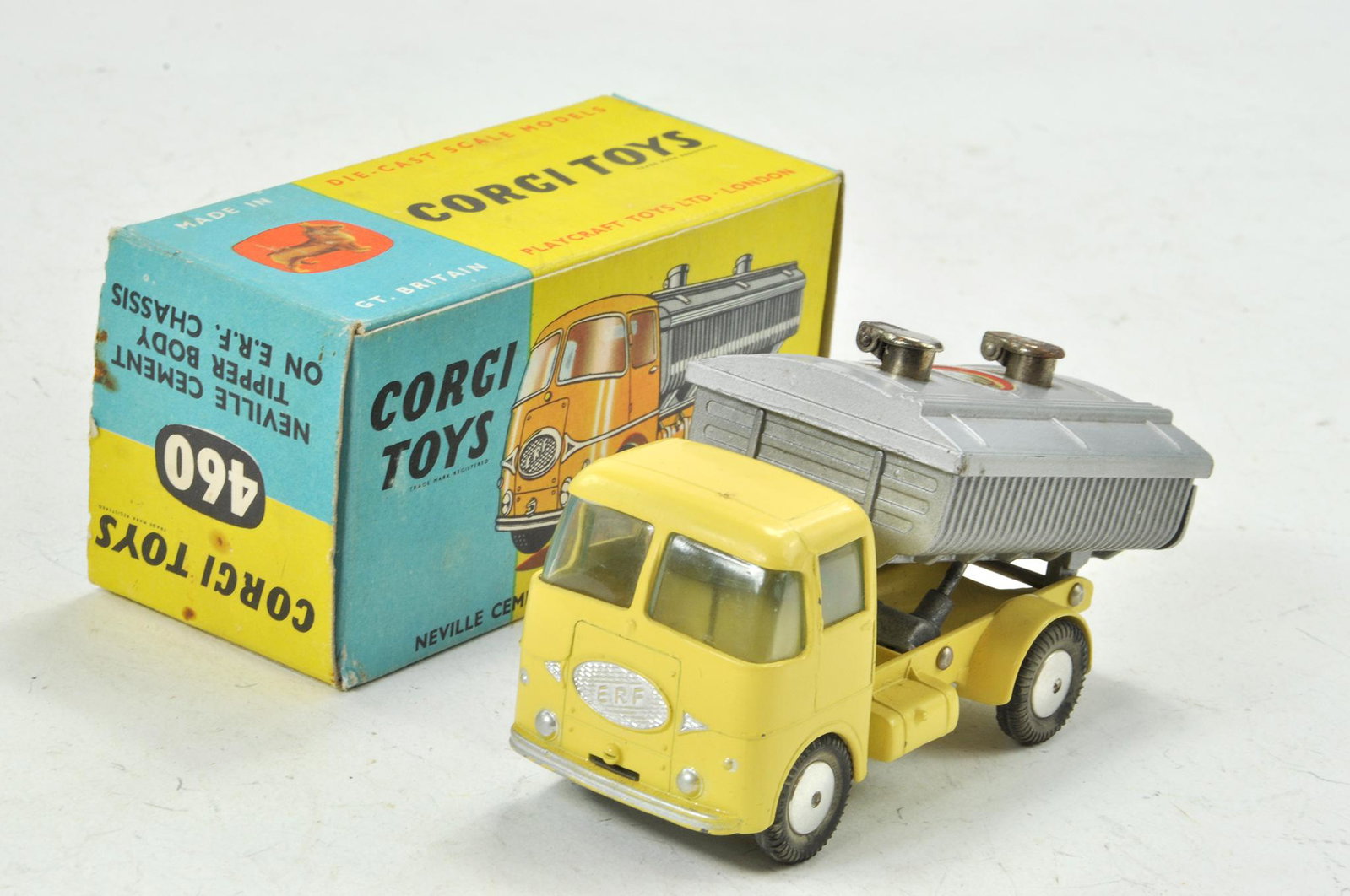 Corgi No. 460 Neville Cement Tipper on ERF Chassis.: Corgi No. 460 Neville Cement Tipper on ERF Chassis. Lemon Cab and chassis with silver tipper body, silver trim, metal - chrome caps. Generally excellent, little sign of wear in very good to excellent 
