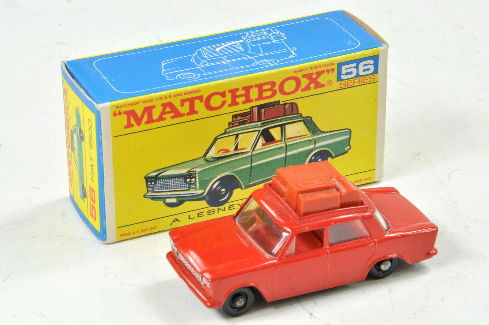 Matchbox Regular wheels No. 56b Fiat 1500. Red with red: Matchbox Regular wheels No. 56b Fiat 1500. Red with red interior, light brown luggage, black base and wheels. Appears excellent with little, if any marks contained in excellent original box.