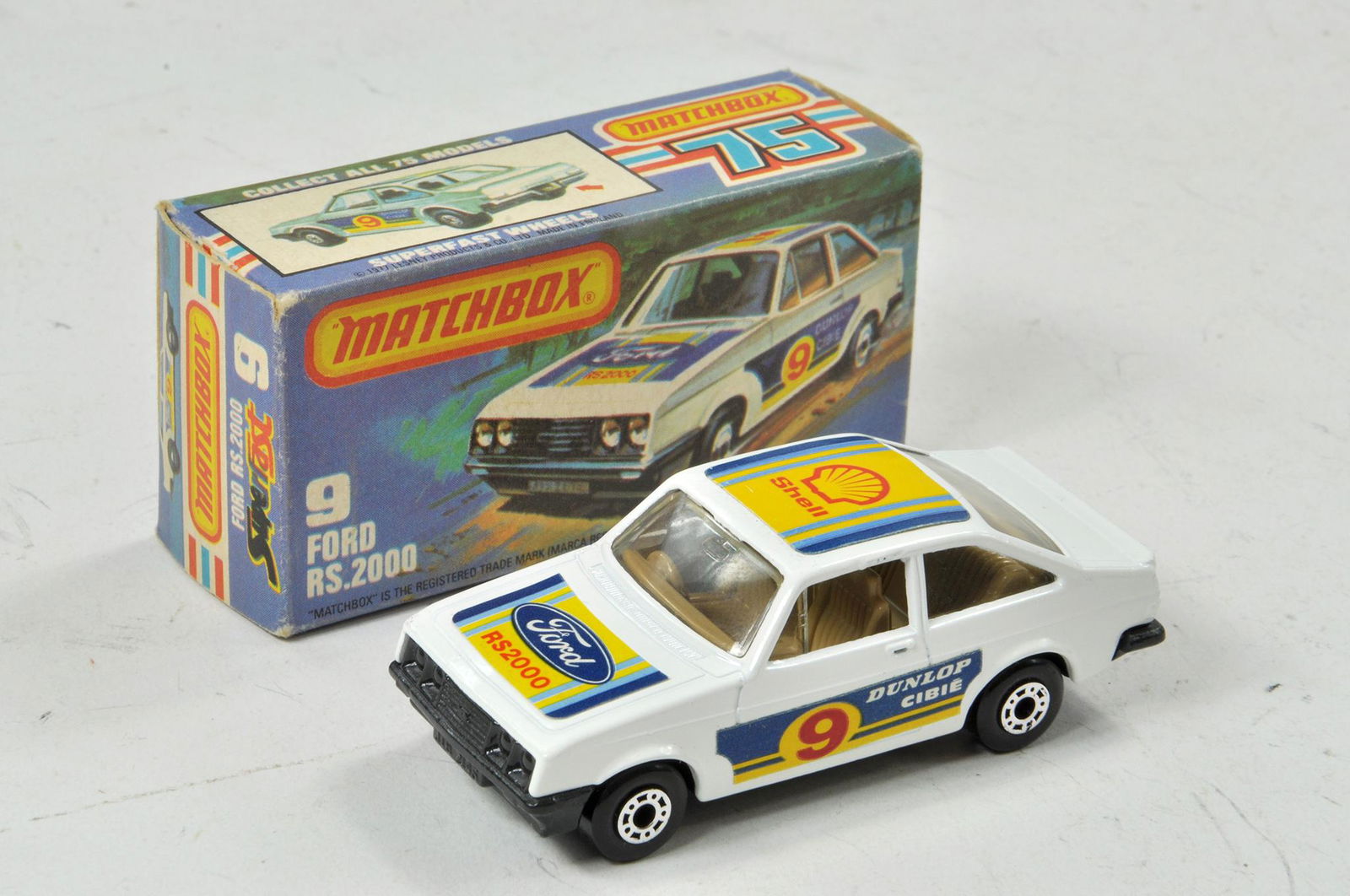 Matchbox Superfast No. 9F Ford Escort RS2000. White: Matchbox Superfast No. 9F Ford Escort RS2000. White body, tan interior, black base, clear glass '9''ford', 'shell' 'Dunlop' decals. Appears excellent with little if any minor marks present contained i