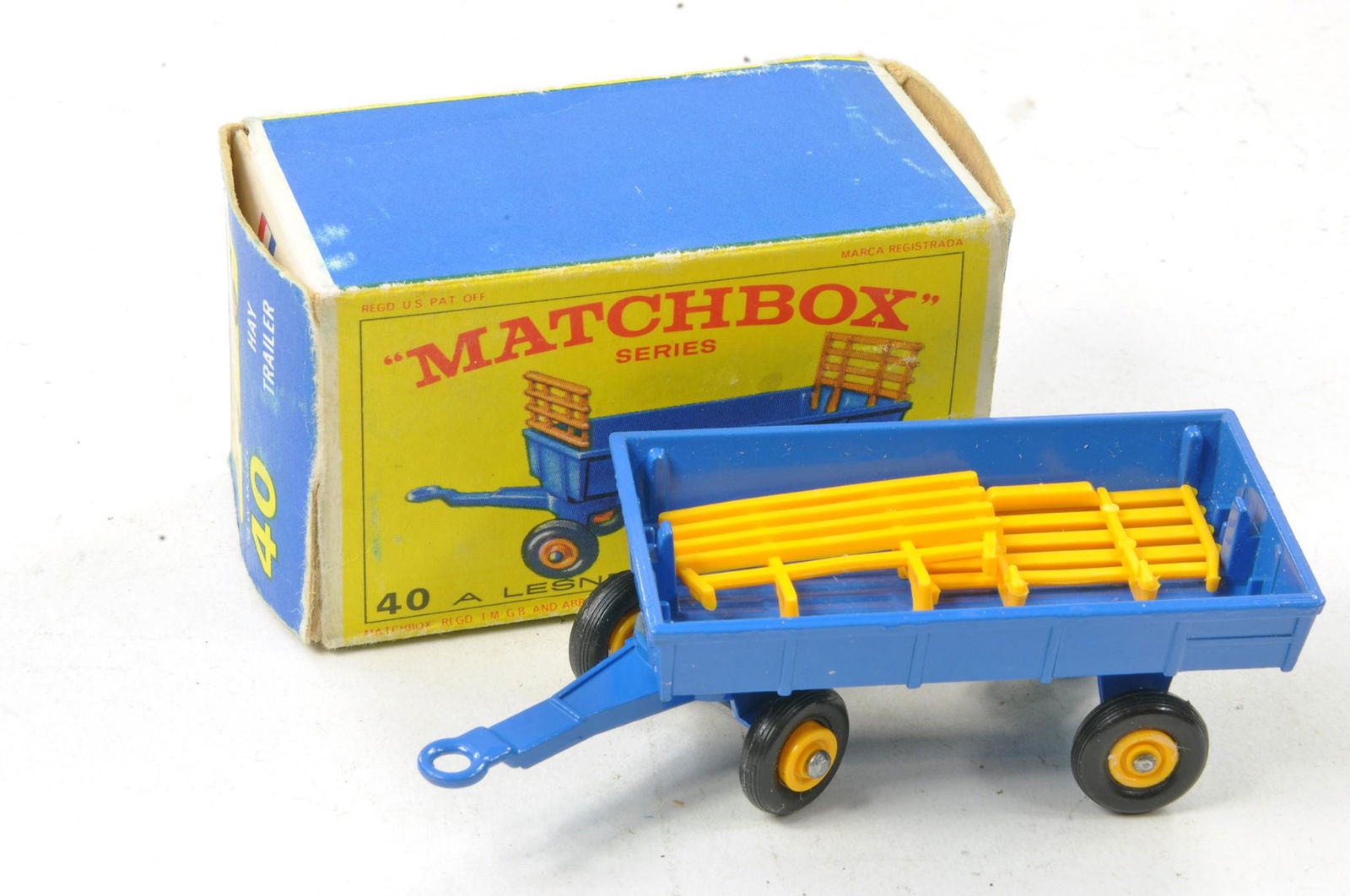Matchbox Regular Wheels duo of 40c Hay Trailer. Blue with Yellow Plastic Racks, note different base (1 of 1)