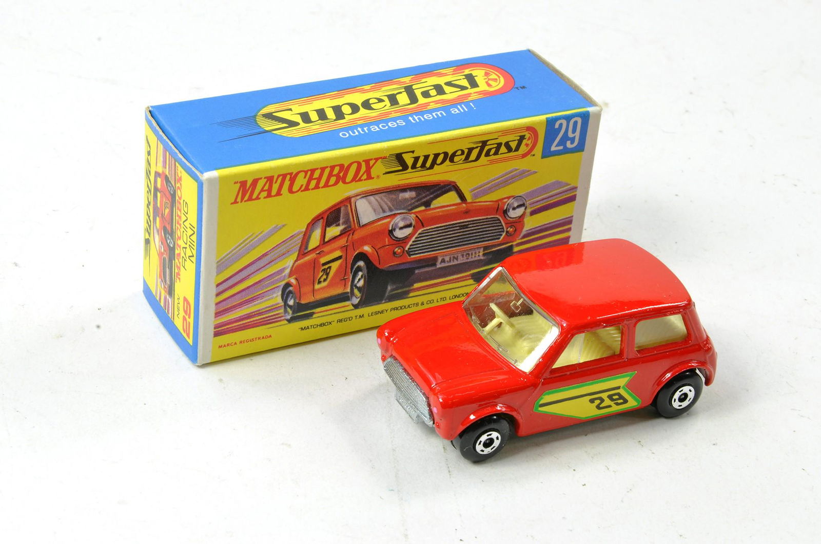 Matchbox Superfast No. 29b Racing Mini. Red, clear windows, unpainted base, racing no.29 green (1 of 2)