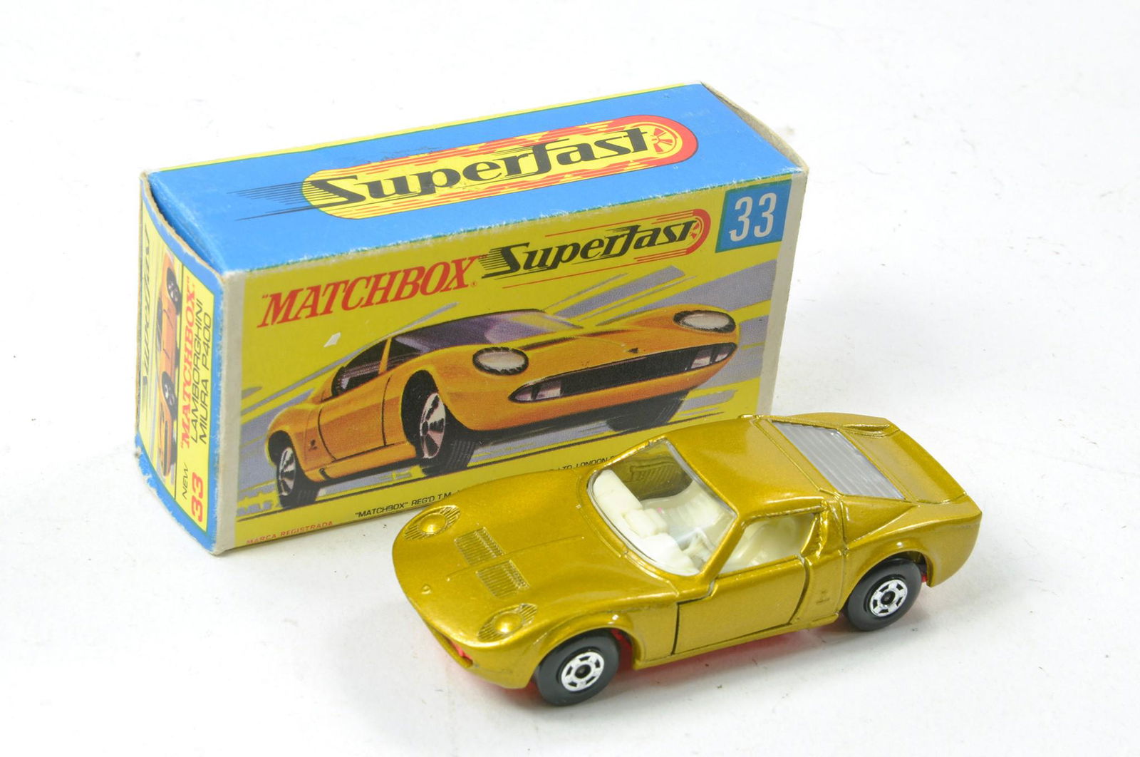 Matchbox Superfast No. 33a Lamborghini Miura. Metallic Gold body with high arches, white interior,: Matchbox Superfast No. 33a Lamborghini Miura. Metallic Gold body with high arches, white interior, pink base. Excellent, no obvious sign of wear in excellent G type box plus one other.